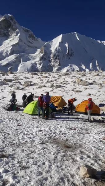 Mountaineers are having tea and coffee in Larkya Base Camp