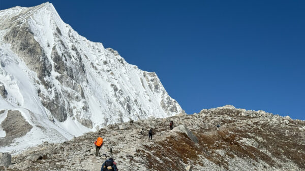 Tsum Valley with Manaslu Larkya Pass Trek: A Remote Himalayan Adventure 4 Trekkers Crossing Larkya Pass